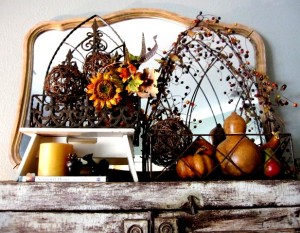 Year round I keep the top of this book case adorned with the mirror and the rustic iron planters. I simply change the decor as the season or mood strikes.